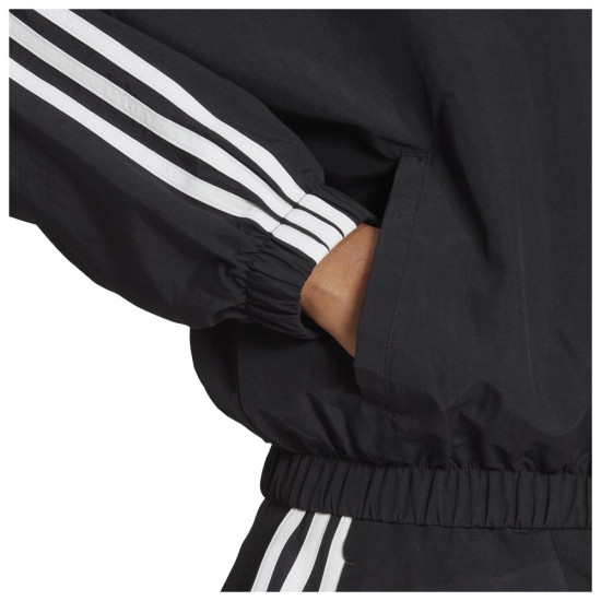 Adidas Γυναικείο αντιανεμικό μπουφάν Essentials 3-Stripes Woven Windbreaker Adidas Γυναικείο αντιανεμικό μπουφάν Essentials 3-Stripes Woven Windbreaker
